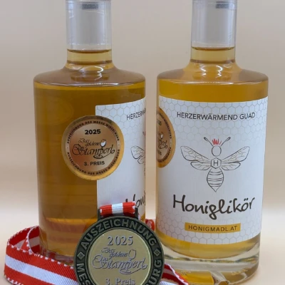 Logo von „Honigmadl“  Imkerei Heidi Guggenberger